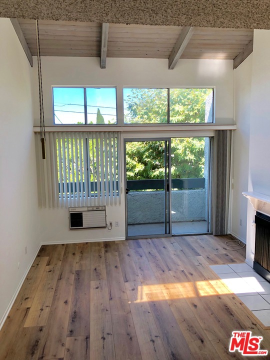 4900 Overland Avenue 274 Culver City, California Gorgeous bright top floor interior facing 2 bedroom 2 bath condo for lease. Private and quiet location with direct access. This condo features lovely high vaulted ceiling in living room with beautiful upgraded laminate wood floors. Updated stainless appliances in kitchen with 2 nice bedrooms and 2 baths. Gas fireplace in living room with a lovely patio. This wonderful gated complex features a swimming pool, hot tub, tennis courts, rec room with ping pong and 2 car parking in a gated and covered parking area. Windsor Fountain is located in the top rated Culver City School District with Farragut Elementary and near all Culver City shopping and entertainment.