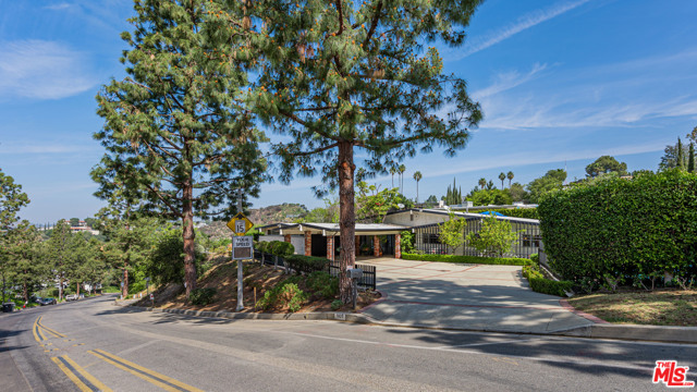 1920 Loma Vista Drive Beverly Hills, California Beverly Hills Schools. Just moments from Sunset. Incredible opportunity to own a very livable home on a prime corner lot in one of the most prestigious north of sunset streets-neighborhoods in Beverly Hills, Trousdale Estates. This very private oasis has major upside and investment potential. Property features a great floor plan, stunning views, an oversized driveway, cedar sauna, sparkling pool and great privacy. The Large flat 22,500 Foot Lot is in a beautiful verdant setting surrounded by mature landscaping. This is one of the lowest priced estates north of Sunset in this most sought after location.