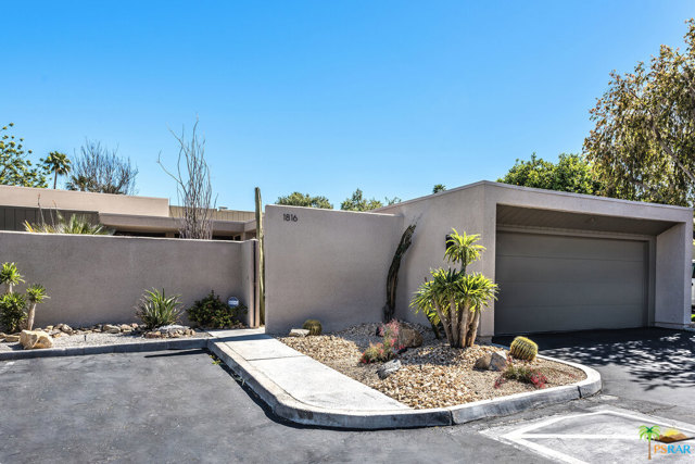 1816 S La Paloma Palm Springs, California Great opportunity to put your personal touches on this fabulous large two bedroom + den home! Located in the heart of Canyon South 3, a wonderful architectural community in the coveted Twin Palms neighborhood, this home offers an updated kitchen, a huge living area perfect for entertaining thanks to its built in bar and fireplace, two en-suite bedrooms and a den which could be a third bedroom. With a two car garage, full laundry room, and a private patio, this is the perfect Palm Springs home. Canyon South 3 offers 2 pools and spas, as well as 2 tennis/pickle-ball courts. Canyon South 3 is on lease land with current expiration in 2041. Any financing will require a 15 year mortgage.
