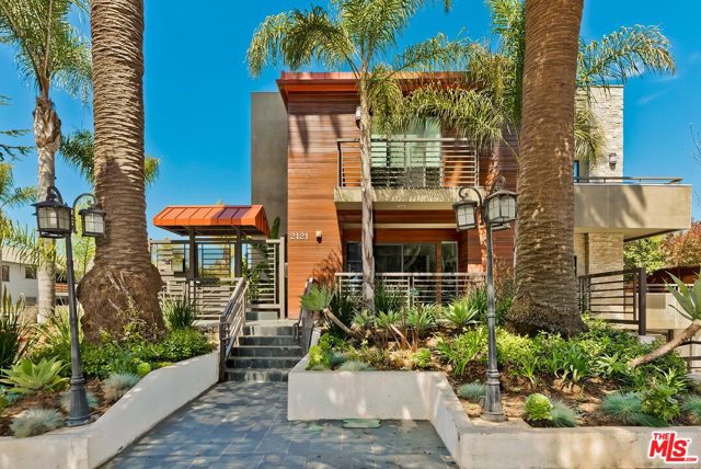 2121 Virginia Avenue 106 Santa Monica, California Welcome Home! This Sleek and sophisticated Tri-Level Townhome was built in 2010 but pleasantly reimagined and beautifully renovated in 2015. The spacious indoor and outdoor flow is a plus for today's "at home" environment. Open Kitchen, Living Room and Dining Area are ideal for entertaining that effortlessly flows to the outdoor patio. Intimate fireplace, brick accents and subtle tasteful tones complete the ambience creating a comfortable and warm atmosphere. Rooftop deck with expansive views plus additional outdoor balconies off each bedroom provides additional space to retreat and unwind. Multipurpose room includes additional desk space, Sauna and Laundry. Ample Storage throughout. Private 2-car garage with direct access. The proximity to Virginia Avenue Park is a plus as an extended yard for recreation, picnics, athletics, the Library and weekly Farmers Market. Excellent School District. Close proximity to restaurants, cafes, grocers and other daily necessities as well as freeway access.