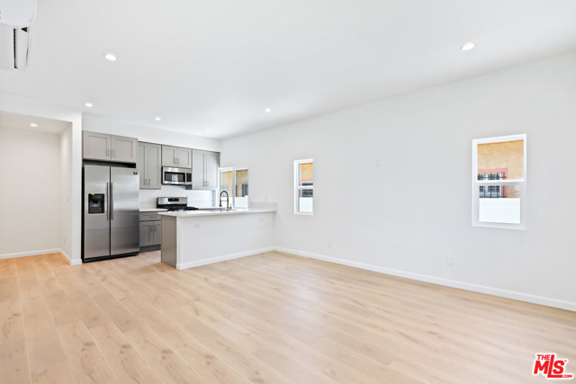 5234 W 20Th Street Los Angeles, California Stunning Completely remodeled Spanish style residential Quadruplex in trendy mid city neighborhood! Four units available for lease in this Boutique style building all with open floor plans, 9FT ceilings, gourmet kitchens with breakfast bar, Quartz counters & stainless steel appliances. All units get an abundance of natural light and have been entirely renovated throughout, new dual pane windows, air-conditioning,recessed lighting, floors, stack-able washer + dryers, spacious bedrooms, closets & bathrooms with tasteful tiling. Building is fully gated, secured with 24 hour surveillance, two car tandem parking, dial by name directory & a charming front yard / patio area. Central Mid-City location just minutes to Culver City, Beverly Hills, Down-Town LA, West Hollywood and all West-side surrounding areas. Transit Oriented Community and in close proximity to the Expo line and major public transportation hubs. Multiple upstairs & downstairs units available. Contact agent for details.