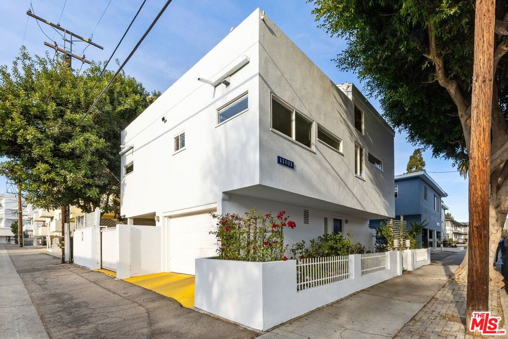 11811 Idaho Avenue Los Angeles, California This architectural single family home is located in a vibrant west Los Angeles neighborhood within close proximity to Sawtelle Blvd, home to some of the best sushi restaurants in the city. The first level has access to the attached one car garage and the guest suite. Up the stairs to the main level with an open concept living/dining area adjacent to the kitchen. The kitchen has a Viking stove and granite countertops. Two bedrooms with an updated bathroom complete this level. Up another set of stairs to the loft and expansive roof top deck. Perfect for al fresco entertaining or a quiet afternoon relaxing in the California sun. Centrally located within easy access to UCLA.