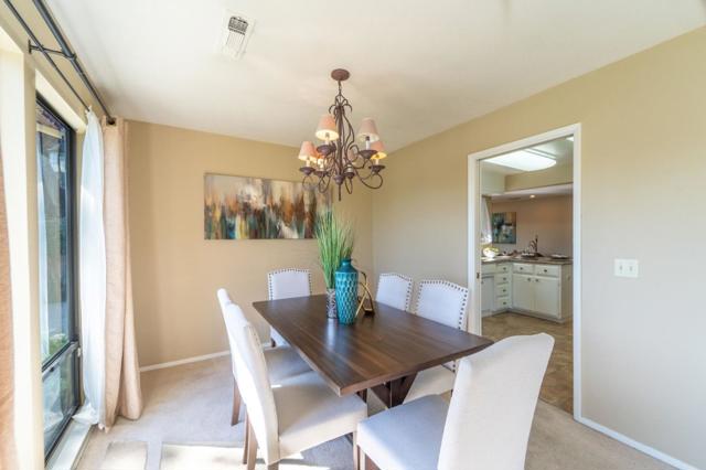 Formal dining room w/ views of the lake. Create amazing memories enjoying holiday brunches & dinners