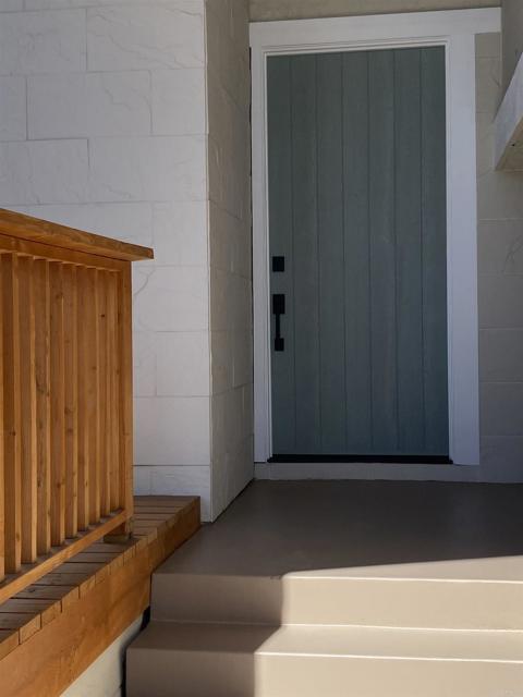 Tall private front door