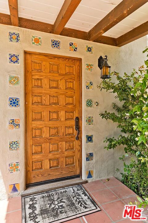Spanish tiles surrounding the front door