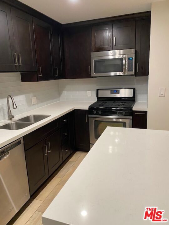 1466 S Canfield Avenue, Los Angeles CA: https://media.crmls.org/mediaz/5caecb46-eae8-4d18-8448-8be27bf387cd.jpg