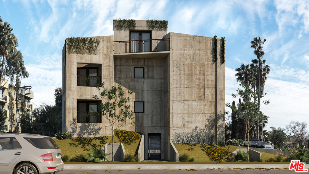 Welcome to this Brutalist-style Architectural home in the heart of the Hollywood Media District.  This versatile property can be used as a single family dwelling or divided into an owner's unit with separate apartment and offices.  This 3 story live work compound is one of a kind.  Includes an expansive rooftop deck with 360 views and built in hot tub.  Raw concrete walls, custom glass windows & Douglas Fir wood flooring.  Master bathroom is a complete steam room with round soaking tub and stone countertops.  First floor includes a garage with direct access, two bedrooms and a small yard with additional covered space for gym or extra storage. Open concept kitchens on both the 2nd and 3rd floor with custom cabinets, stone countertops and stainless steel appliances.  Schedule a tour of this beautiful property today!