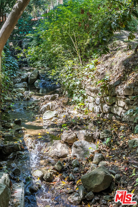 Tranquil Creek Runs Through Property