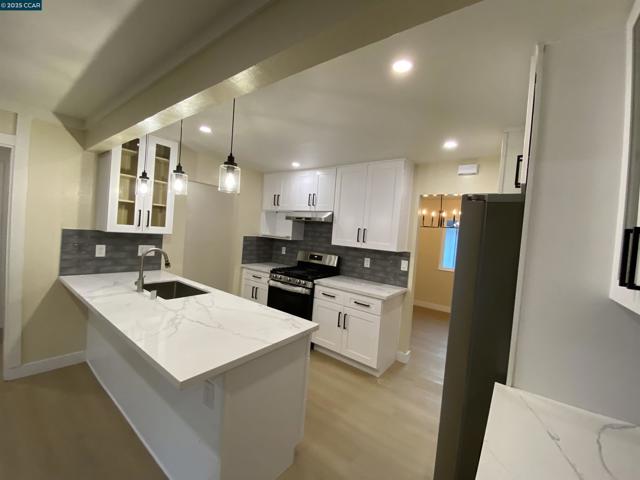 3063 Simas Ave, Pinole CA: https://media.crmls.org/mediaz/5e3dc3f8-209f-43e1-8cff-0a9f7644c92d.jpg