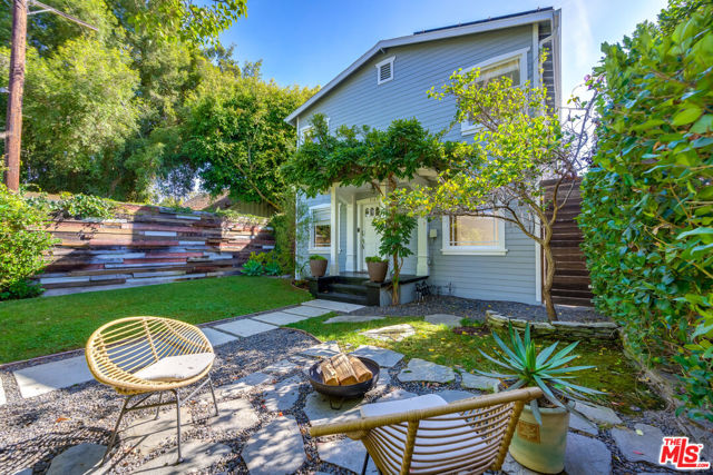 918 Nowita Place Venice, California Nestled within one of the most desirable walk streets in Venice, welcome to this charming 2 story residence featuring 4 bedrooms, 3 bathrooms + an office and detached rec room. Outdoor entertaining is a breeze in the lushly landscaped spacious front yard and back deck with dining space and a built in hot tub. The first level has an open floor plan with the kitchen, dining, and living areas illuminated with many windows and a sliding glass door to the back deck providing an indoor/outdoor flow. Luxurious cooks kitchen with a bar counter, includes high end stainless appliances, custom cabinetry with stone counters. First floor bedroom faces the beautiful walk street. Gorgeous and private master suite with huge walk in closet and spa like en-suite bathroom with dual vanities, separate tub and shower for two. Rounding out the second level, two generous size bedrooms with a shared bath and an office space. Outside you will find a stunning detached rec room with vaulted ceilings and sliding glass door, a perfect place for relaxation.