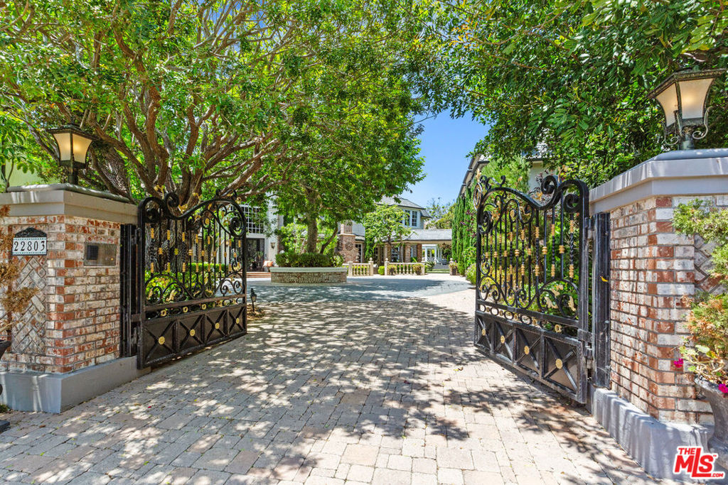 This 2019 Philharmonic House of Design featured estate is truly an extraordinary property, expansive and grand, with unobstructed ocean and coastline views.  A Hamptons-style master-peice of 7,000 s. ft., located in the 24-hour guard gated coastal community of Monarch Point, on a premium cul-de-sac location and perched high atop the bluff of Laguna Niguel Mountain, offering panoramic vistas of Three Arch Bay's whitecaps and Catalina Island.  Situated on 31,000 square feet of lush grounds, with patios, a gazebo, in-ground pebble-tech pool and spa, waterfalls and streams, plus a detached guest house, that combine to create a relaxing resort-like atmosphere.  Estates at this level of grandeur are extremely rare to come on the market in coastal south Orange County.