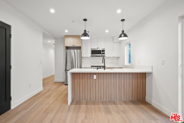 1331 N June Street, Los Angeles CA: https://media.crmls.org/mediaz/5fda088b-25ad-4cf6-bcad-831e44dbadc9.jpg