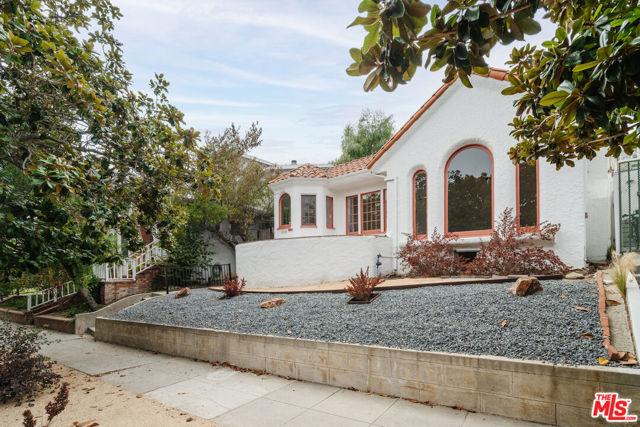 Ideally situated in Venice near Rose Ave, Abbot Kinney, Main St. & the Beach, this newly updated charming Spanish style bungalow with hardwood and laminate floors throughout features 3 bedrooms and 2 full baths. Large picture window in front living room looks out at mature Magnolia trees. Detached 2 car garage with bonus work shed. Enjoy your morning coffee in the front round breakfast room with ornate plaster ceiling or on the large front patio which sits above the street.