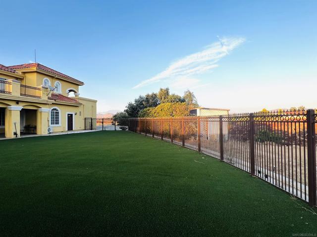 Backyard fence with gate.