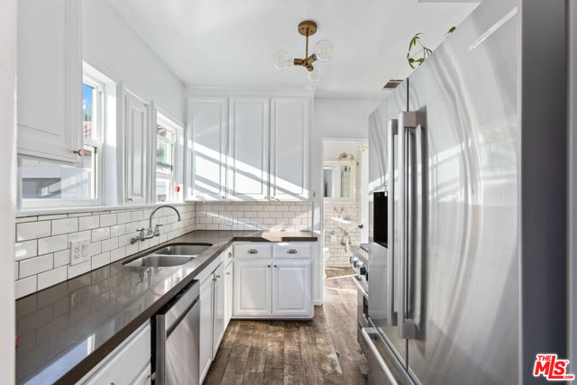 8023 Clinton Street, Los Angeles CA: https://media.crmls.org/mediaz/60d0950e-d8c2-4cfd-8e6d-d8faaefa63dc.jpg