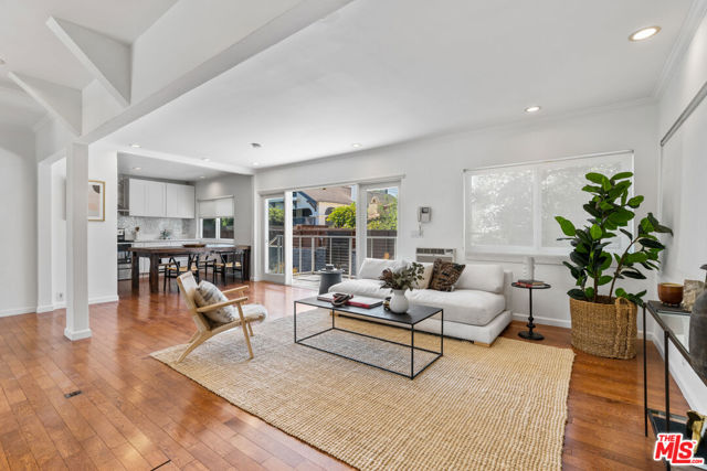 1101 MAIN Street Venice, California Recently updated Venice Beach walk-street home with zen-line garden, expansive roof deck, and attached guest house. The upper level is an open-concept two bedroom, one-bath with french doors overlooking a private garden with two outdoor patios, fire pit, succulent gardens, and private access to the roof deck. The lower level is a large one-bedroom, one-bath guest house accessible through the main level or through a separate entrance. This home can live as a three-bedroom single family house with an additional den, or as a two bedroom main house with a one bedroom ADU. Perfectly located between the beach and Abbot Kinney on one of the best walk streets in Venice. Walk to all Venice has to offer!