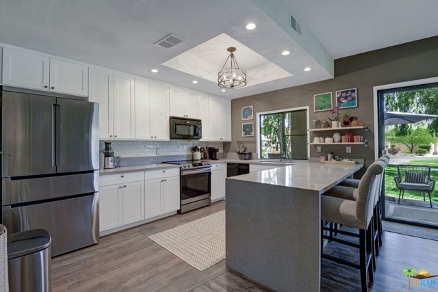 67342 Cumbres Court Cathedral City, California Nestled deep behind the gates of Desert Princess and away from any road noise, you'll find this beautifully appointed & extensively remodeled two-bedroom and two-bathroom end-unit retreat. With a neutral but warm color palette, designer finishes, and attention to the smallest details, you'll feel immediately at home here. One of Palm Springs most amenity-laden clubs, Desert Princess offers a 27-hole golf course, spa, dining, tennis courts, many pools, and more all set to take in sweeping mountain and greenbelt views. This home offers the best of everything you imagine you'd want for your desert lifestyle, all within a quick drive to Downtown Palm Springs. A perfect primary, secondary, or investment property, bring your pool towel and a vacation attitude to your new home.