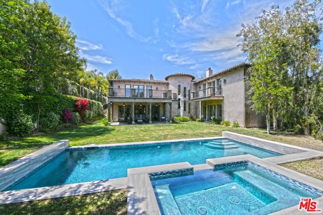 3039 Roscomare Road Los Angeles, California This Magnificent Contemporary-Mediterranean, private, Bel Air Estate is in pristine condition and sits on over a half-acre of land. Thoughtfully laid out for both entertaining and supreme livability, the spacious gourmet kitchen with top-of-the-line Viking appliances opens to the family room looking out to the resort-style pool and spa. The graceful staircase leads to the generous second floor sitting area which serves as a secondary family room for the upstairs bedrooms. The master suite incorporates its own huge private balcony, dream bathroom, walk-in dressing room and adjoining retreat for the ultimate convenience and privacy. Featuring two-story entry foyer, high ceilings throughout, 6 bedrooms, 8 baths, large family room all open to large-covered patio space for dining alfresco, luscious green lawns, pool and spa. Formal dining and living rooms, library/office/study, wine cellar, 5 fireplaces, gym, large private balcony, large motor court, 3 garages with high ceilings, service entrance, centrally located to both Westside and Valley amenities. Seller financing available.