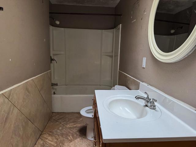 407 W. 7th St., Stockton CA: https://media.crmls.org/mediaz/62ccfc16-8813-4daf-8428-94236100bef1.jpg