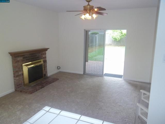 Has wood burning Brick fireplace and New Carpets