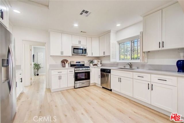1856 W 14th Street, Los Angeles CA: https://media.crmls.org/mediaz/637e1b45-5280-49de-974d-edb8f8007b09.jpg