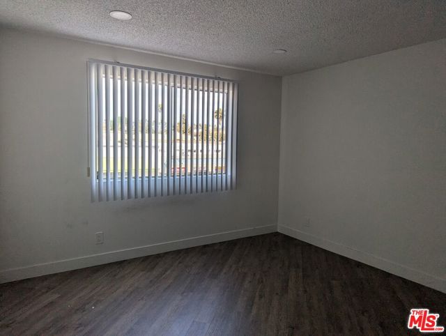 310 S Kenmore Avenue, Los Angeles CA: https://media.crmls.org/mediaz/63912ace-01c2-453f-bfb1-8ee927bf03cc.jpg