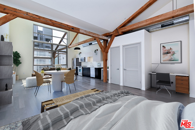 527 Molino Street 219 Los Angeles, California Top floor loft offers dramatic vaulted ceiling and double height dual pane windows which look out to a tranquil courtyard at Barker Block's Warehouse No. 1. Nestled away from active streets, providing peace and quiet; the perfect place for working from home. Century-old heavy timber posts and beams. Gorgeous grey hardwood floors. Stainless steel Jenn Air appliances. Quartz countertops. Soft-closing cabinets & drawers. Hugh designer bathroom. Washer-dryer in unit. Nest thermostat. Parking in gated, controlled access garage. Breathtaking resort-style rooftop pool/spa/BBQs/fire pits/fitness center. Free common area WIFI. 24/7 security. Across from Urth Caffe & the LA Cleantech Incubator. Quick access to a centralized freeway network. Near USC; walk to SCI Arc. Check out the red-hot Arts District - home to Spotify, Warner Bros. Music, SOHO House, award-winning 5- star restaurants like Bavel & Factory Kitchen, clubs, taverns and all things hip and trending.