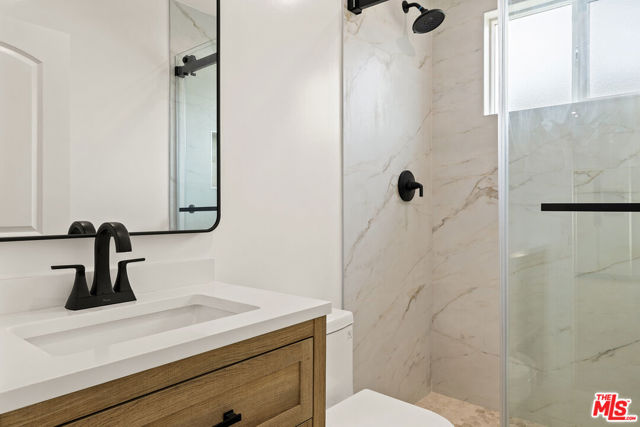 1558 W 47th Street, Los Angeles CA: https://media.crmls.org/mediaz/642cd117-e3b8-4b4a-a45d-aa1a8810223f.jpg