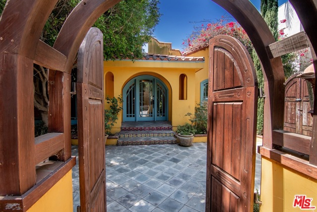 702 14Th Street Santa Monica, California North of Montana Character Spanish Revival! This special home was extensively remodeled in 2000 and is just waiting for a lucky owner to add some TLC. Enter through gated front courtyard into a lovely private retreat. Charming details include cathedral beamed ceilings, arches, and vintage decorative tile. Stylish chef's kitchen opens to side patio with fountain. Main bedroom suite with fireplace and walk-in closet leads to deck with outdoor fireplace overlooking back yard, pool, and spa. Two additional large bedrooms have ensuite bathrooms, plus a powder room for guests. Central HVAC, copper plumbing, hardwood floors. All of this is steps from upscale boutiques and dining on famed Montana Avenue. Opportunity knocks!