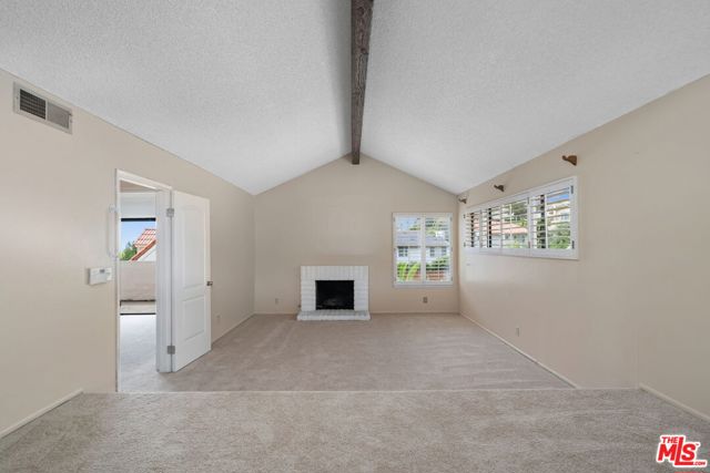 primary retreat with vaulted ceilings