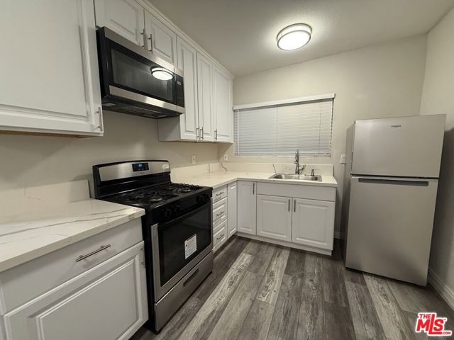 2922 S Budlong Avenue, Los Angeles CA: https://media.crmls.org/mediaz/647c055c-0c81-458f-bb99-a0723675a1e3.jpg