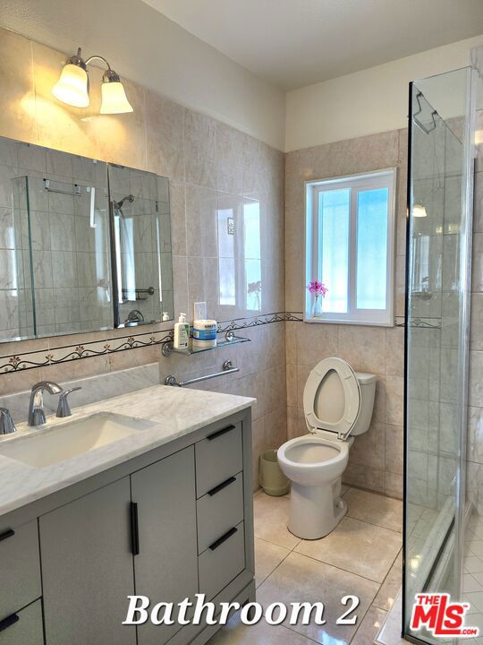 857 S Norton Avenue, Los Angeles CA: https://media.crmls.org/mediaz/6485d1e4-7104-47de-912d-597efb1b2542.jpg