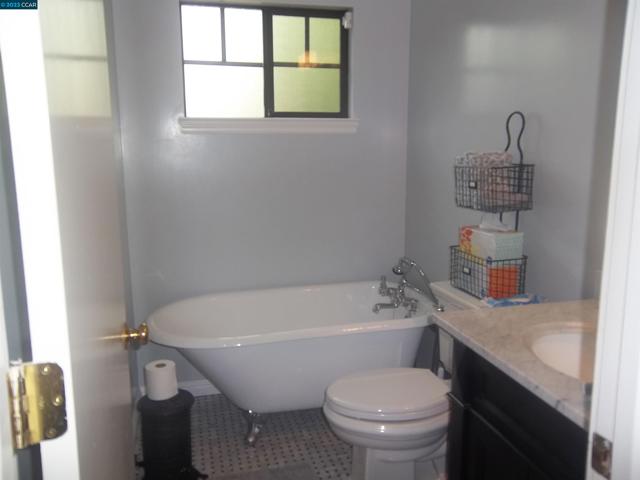 Updated with freestanding Claw Tub with shower hand held Faucet