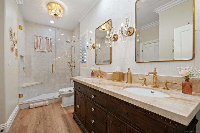 Beautifully appointed upstairs bathroom.  Gold Kohler fixtures, 1/2