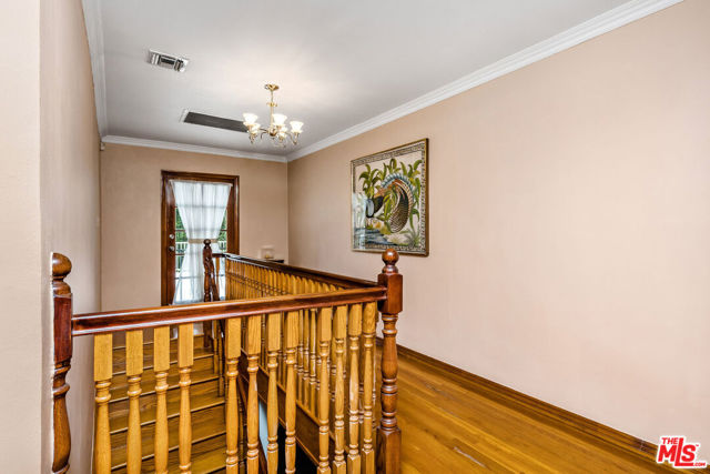 257 S Van Ness Avenue, Los Angeles CA: https://media.crmls.org/mediaz/64e6ad64-63fd-46c2-b95f-b2dae2e4302c.jpg