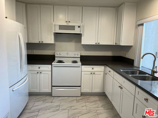 18524 Mayall Street, Northridge CA: https://media.crmls.org/mediaz/656c0c2c-e6df-4be8-bbab-7c11b6de2b8a.jpg