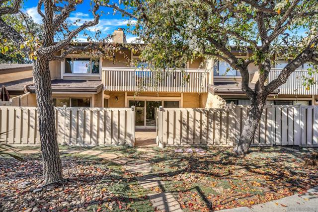 View to backyard patio.  Gate opens to common areas.