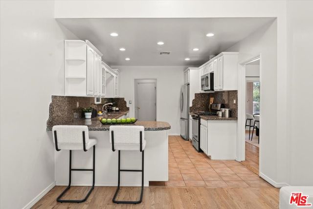 1220 N Norman Place, Los Angeles CA: https://media.crmls.org/mediaz/657c5ffb-f73f-48bc-9ffe-a46c04dcf328.jpg