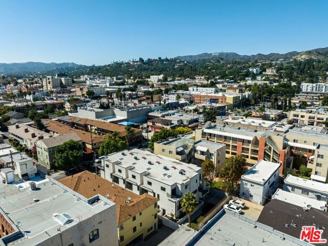 1624 Normandie Avenue, Los Angeles, California 90027, 3 Bedrooms Bedrooms, ,2 BathroomsBathrooms,Townhouse,For Sale,Normandie,23311703