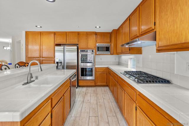 Cabinets space Counter space and Open Space!!! I love this kitchen! its large, open, there's tons of cabinet space, tons of counter space! Everyone can cook together and not get in the way! oh and did you see the new stainless steel appliances!!!