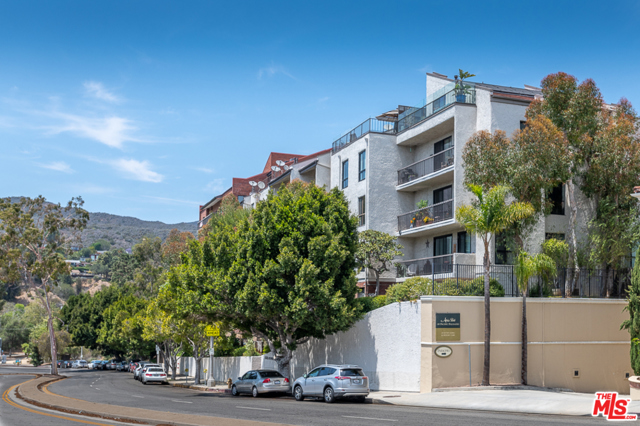 15515 W Sunset Boulevard 111 Pacific Palisades, California Location , Location, Location.. This is hands down the "Best" Location in the Palisades. This 2 bd 2 bath is a needle in a haystack. This completely custom designed totally done unit is second to none.. Beautiful Custom designed kitchen with marble counters, custom lacquer Italian cabinets , stainless appliances, breakfast bar, custom lighting throughout , Hardwood floors, Custom Marble Fireplace in living room overlooking balcony with lots of greenbelt. Feels like you are in Ojai or Carmel.. Nice light and bright dining room with great Vibes.. All Custom baths with designer tile and Italian style cabinets.. One bath has Shower/Tub and master suite has large shower, dual sinks and walk in closet..Rare Laundry inside unit, Beach Close, Gelsons is across the street and the New Fancy Caruso Palisades Village down the street, steps to all shops, restaurants , Temescal Hiking Trails next door, and top rated school down the street. This building has a beautiful private sparking pool/ spa, Fitness center with dry sauna and more . Live like a rock star . You will always enjoy the Ocean breeze and fresh air.. This is a very rare find and these units never become available so run dont walk.. This is a flawless beauty that anyone will appreciate. Multi Million Dollar Area. You cannot beat this if you are looking for an amazing done custom condo=Lovin Life