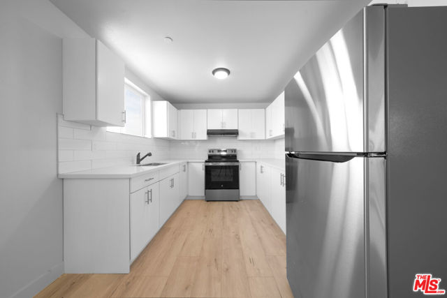 236 W 84th Place, Los Angeles CA: https://media.crmls.org/mediaz/65f31ff1-9e73-4ee1-b3d0-860b43d35082.jpg