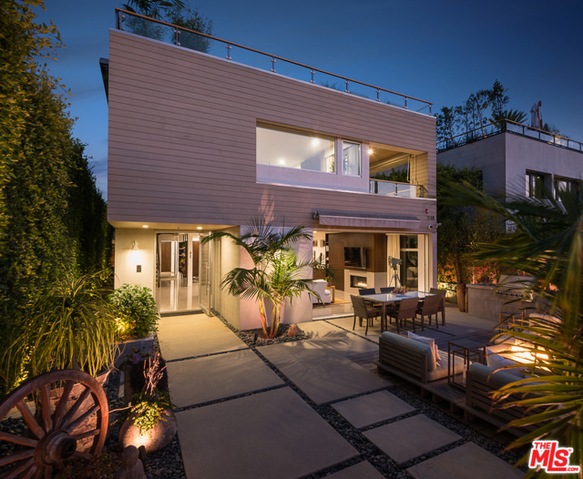 518 Santa Clara Avenue Venice, California With over 5,000 square feet of living space and parking for up to 5 cars, you cannot miss this one! This custom built, exquisitely designed home offers privacy and serenity in one of the most sought after locations in Venice, just half a block off Abbot Kinney. The spacious, bright open floor plan offers 5+ beds, 6 baths, seamlessly combined indoor/outdoor space on all 3 levels, screening/media room & rec room connecting to a must-see rooftop deck. The main living level is an entertainer's paradise with Miele appliances, 2 walk-in pantries, 2 large center islands opening to a spacious dining/family room with large sliding glass doors and luxurious main patio. Equipped with built-in outdoor kitchen, extra large firepit, dining area and custom plunge pool with waterfall. Upstairs you will find all bedrooms, including a stunning master suite with a cozy see-through fireplace connecting you to your very own secluded private balcony. The his/hers custom closets will lead you to a dreamy spa-like bathroom. The upgrades are endless, this home is complete with fully automated Smart Home system, automatic black-out blinds, 12-person hot tub/plunge pool, and hook-ups for rooftop hot tub. Garage will hold 3 cars, along with room for 2 in driveway.