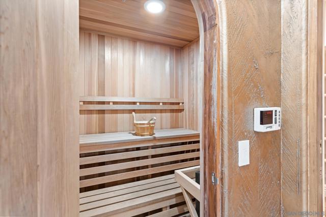 private sauna with custom arched door in 