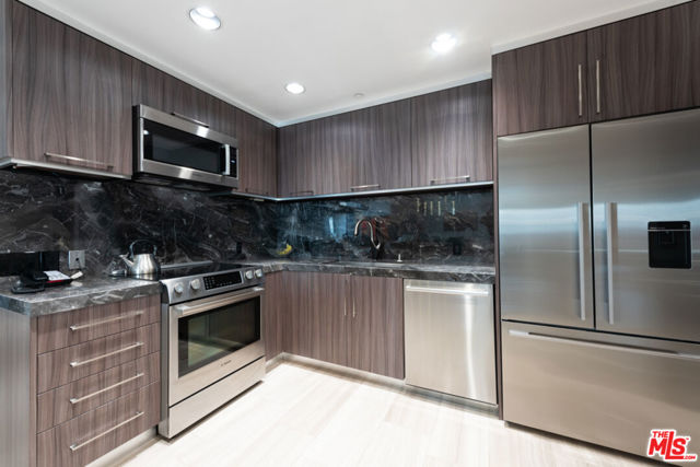 Custom Kitchen with SS Appliances