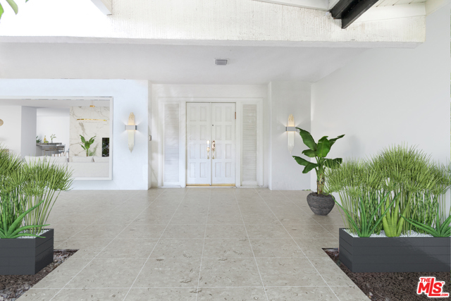 1920 Loma Vista Drive Beverly Hills, California BEST VALUE IN TROUSDALE! This beautifully preserved estate provides exceptional versatility, offering a range of opportunities from an owner-user, to a world-class remodel and/ or development opportunity. Located on one of the most prestigious streets in prime Trousdale Estates, this mid-century modern home sits on prime 22,500 sq ft lot. The current home includes wet-bar, city views, and classic Beverly Hills details throughout. The spacious master suite features over-sized walk-in closet and en suite master bath with steam shower and jacuzzi tub. A sparkling blue pool, cedar sauna, and detached bonus room complete this Trousdale Estates Gem. An unprecedented opportunity to re-imagine or build a future trophy property, just a few short minutes away from the best shops, restaurants, and entertainment the city has to offer.