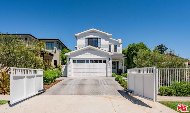 Nestled in the highly-desirable Alphabet Streets neighborhood, you'll find this thoughtfully designed, newer construction completed in 2021. Combining classic charm with a laid-back coastal vibe, this smart home boasts 5 bedrooms, 4 bathrooms, and over 3,400 square feet of living space. After entering through your gated driveway, you'll be greeted by welcoming high ceilings, leading you through a cozy formal living room and dining area that naturally flows into the open, sunlit living room. The chef's kitchen is a delight, with stainless steel appliances, a spacious island, custom cabinetry, a charming breakfast nook, and a convenient butler's pantry. The family room opens up to a generous backyard featuring a BBQ island, fridge, and a custom playset, all protected by tall privacy hedges. The main level also offers practicality with a 2-car garage, a mudroom, and a versatile guest bedroom or office. Upstairs, discover a convenient desk area, skylights, 3 secondary bedrooms, a dedicated laundry room, and a striking primary suite. With vaulted ceilings, an inviting fireplace, an en-suite bathroom boasting a standalone tub and dual sinks, and a roomy primary closet, this space exudes relaxation. This home has been carefully curated to perfection, offering a comfortable and inviting living experience. You won't want to miss out on this stunning property, perfectly located just a short stroll away from the famous Caruso Palisades Village, top-notch dining and shopping options, hiking trails, and the breathtaking Pacific Ocean. Don't let this opportunity to embrace the quintessential California coastal lifestyle pass you by!