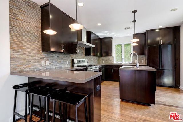 kitchen has sliding hidden doors