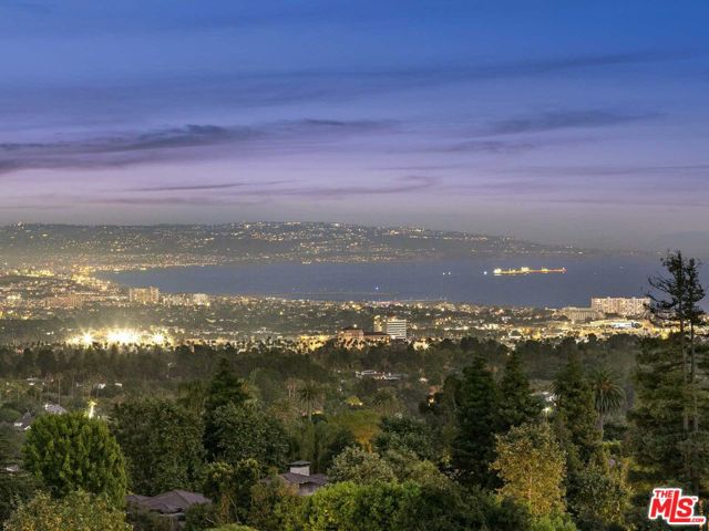 Very unique opportunity to own one of the last oversized lots in the prestigious upper Riviera. With views extending from the San Gabriel and San Jacinto Mountains, Getty Center, Griffith Observatory, DTLA, across the entire city to the coastline, beaches, Palos Verdes, Catalina Island, and the Pacific Ocean, completely unobstructed. Enter into a long, gated, private driveway, you will find a 4,180 square-foot home with a pool and a nice yard that can be renovated. You can add square footage to meet your needs or simply build your dream home from scratch. Come visit and see this spectacular site to experience Los Angeles living at its finest.