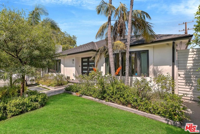 344 S Roxbury Drive Beverly Hills, California Located in one of the most desirable locations in Beverly Hills, this one-of-a-kind contemporary home was completely remodeled in 2014 with permits and the owner spared no expense. Upon entry, an open floor plan welcomes you with views all the way to the backyard creating a seamless indoor/outdoor living experience. Top of the line finishes include European oak floors throughout and a custom kitchen featuring a 10 ft. waterfall island, marble backsplash, and high end appliances from Miele and Gaggenau. This 3,200 sq. foot home is designed for effortless flow to each of the homes 4 beds and 5 baths. A lush backyard features a large pool that is gated for safety and a 2-car attached garage with room in the driveway for 2 cars delivers plenty of parking. Just minutes from Roxbury Park, this one of a kind home is in the center of it all! First Showings start Tuesday, July 7th.
